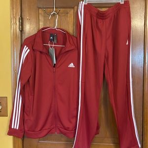 NWT, Women Adidas track suit, zip up front jacket, pants zip at bottom.